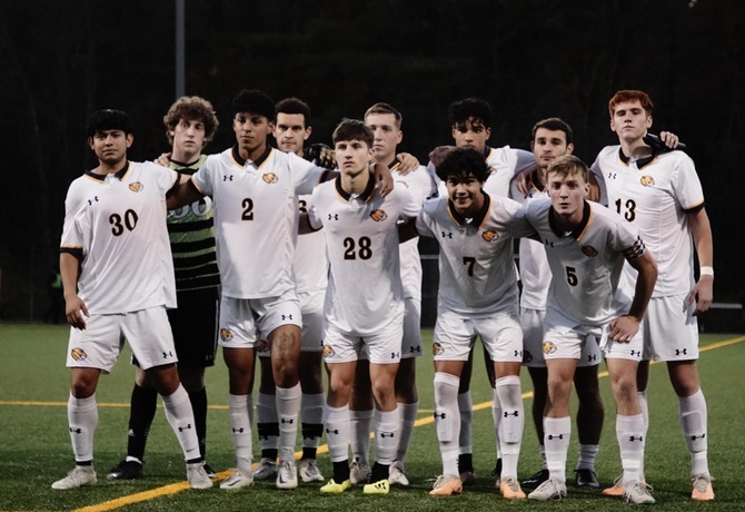 The+MCLA+Mens+Soccer+team+starting+lineup+posing+for+a+photo+prior+to+their+final+game+against+Bridgewater+State+%28via+MCLA+Athletics%29.