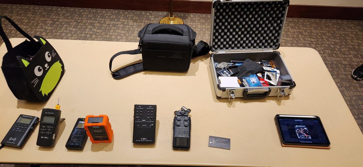 All equipment used while investigation MCLA. From left to right: 3 EMF readers, vibration box, communicator, and another EMF reader