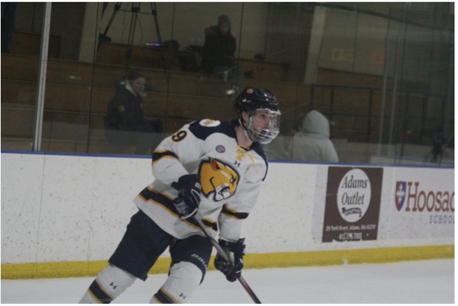 Sophomore forward Addam Brunner (#19) on the ice at Peter W. Foote Vietnam Veterans Memorial Skating Rink in North Adams.